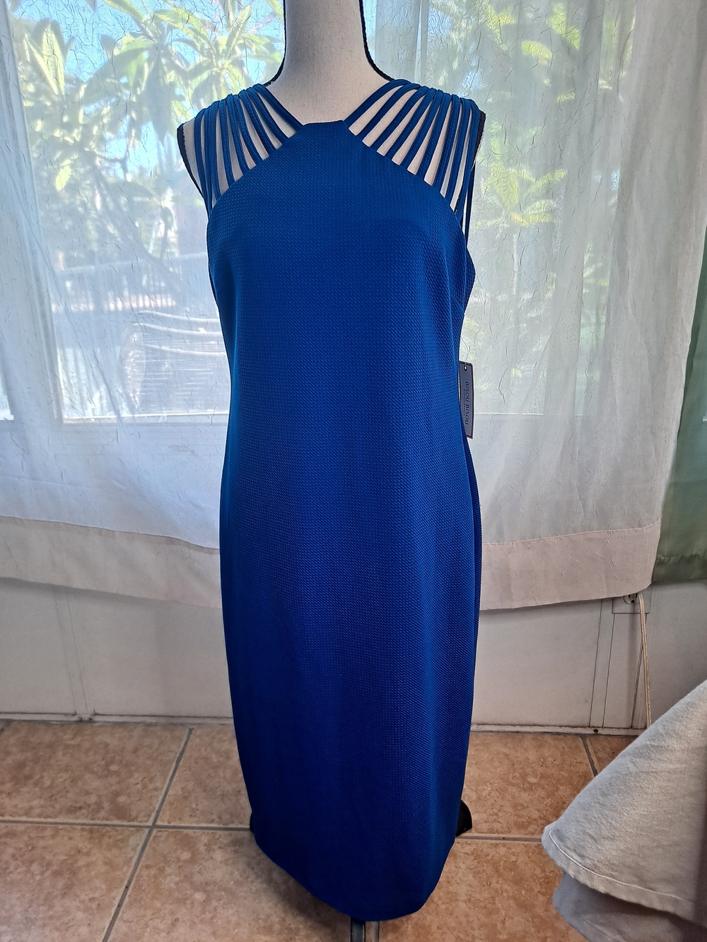 Bisou Bisou Cobalt Blue Textured Sheath Dress. It features a vibrant royal blue.